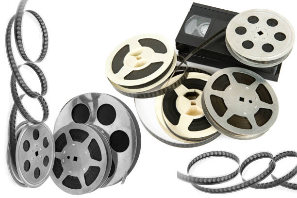 istock Film reel and video cassette isolated on white . Collage. 1475365328
