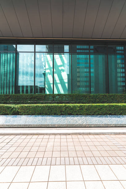 istock Empty footpath in office park, Shinjuku, Tokyo 1475366312