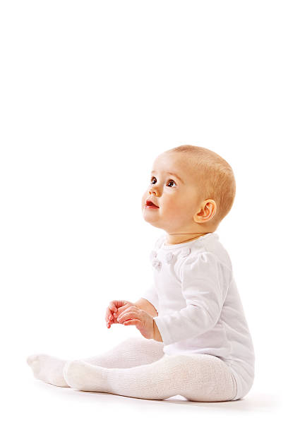 istock Small child play with toys on white background 147536923