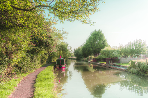 Small sailing boat on the grand union canal in UK