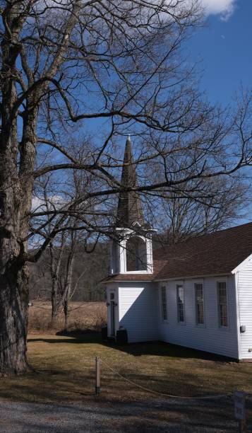 istock Old white church in the countryside 1475369448