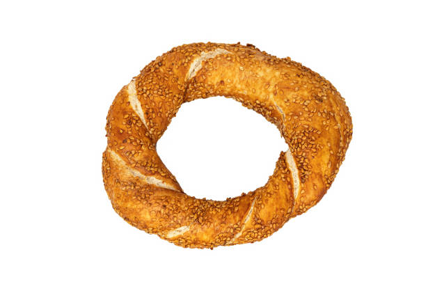 istock Turkish traditional bagel simit isolated on white background. 1475370750