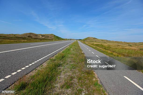 Straight Flat Road Landscape With A Bicycle Lane Stock Photo - Download Image Now - Asphalt, Bicycle, Concrete