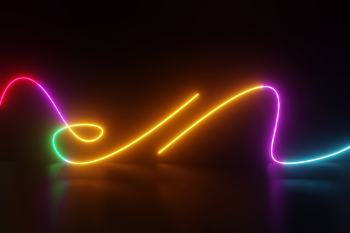 Multi colored neon lighting in the dark background