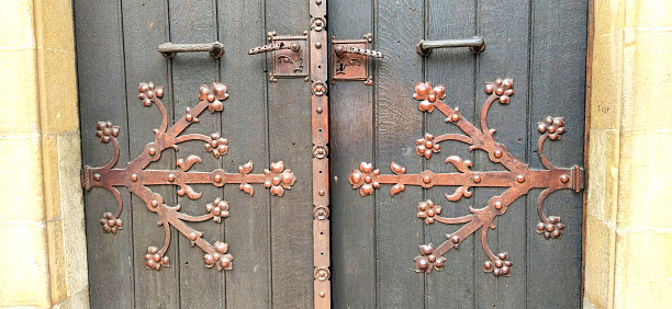 antique Turkish doors. Wooden gate with metal decorations, bolts and locks. Islamic art.