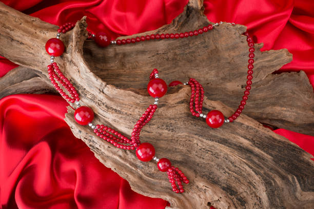 Islam player beads placed in a heart shape against blue background