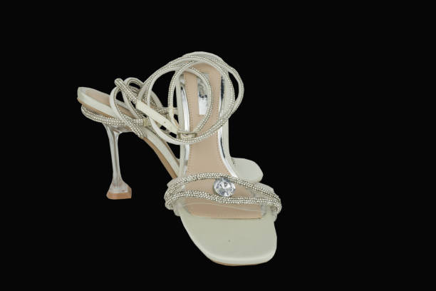 istock on background beautiful white  wedding shoes 1475384812