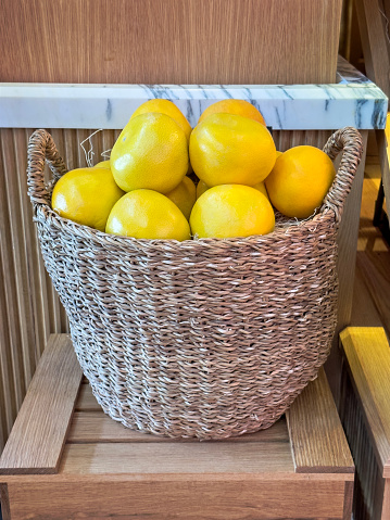 organic grapefruits in a wicker basket super market