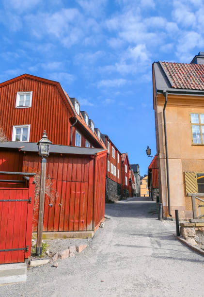 istock Low angle view of houses against sky 1475386896