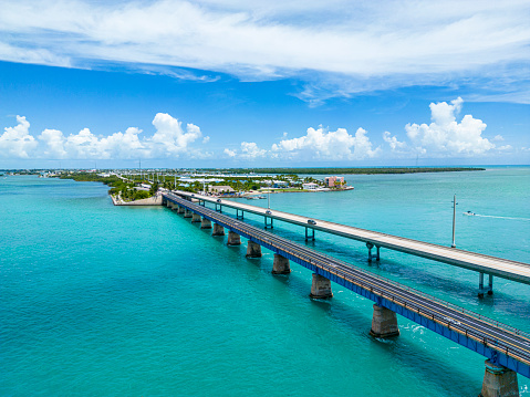 Aerial view of the old and the new Seven Mile Bridge and the Overseas Highway at the Florida Keys and the island Marathon Key in the background