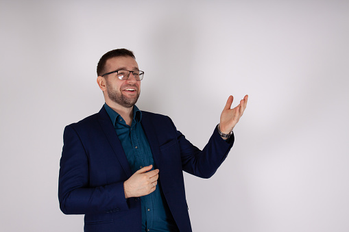 Teacher in front of a black background