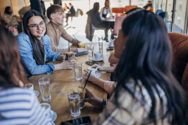 istock Friends together in cafe 1475392857