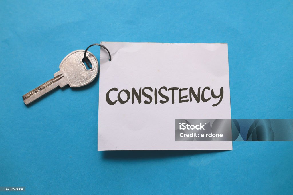 Consistency is the key, text words typography written on paper against blue background, life and business motivational inspirational Consistency is the key, text words typography written on paper against blue background, life and business motivational inspirational concept Repetition Stock Photo