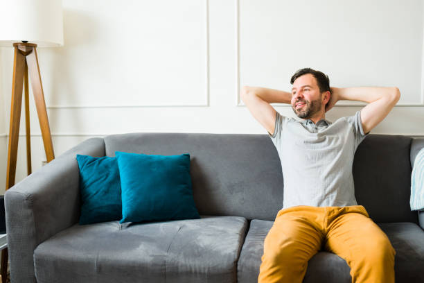 istock Relaxed caucasian man enjoying his leisure time at home 1475393985