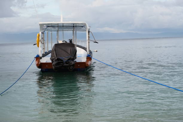 istock A small boat moored by the sea. 1475394255