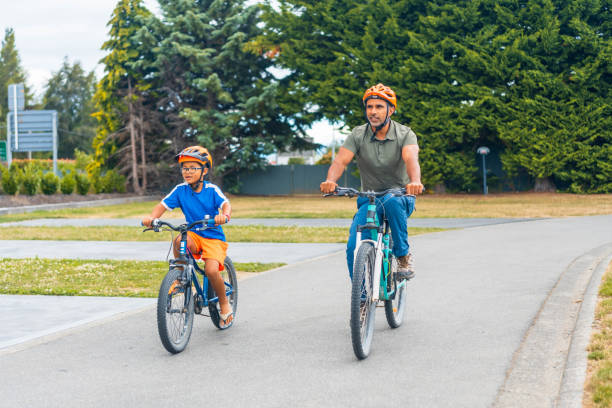 istock Dad and son on cycling trip. 1475394292