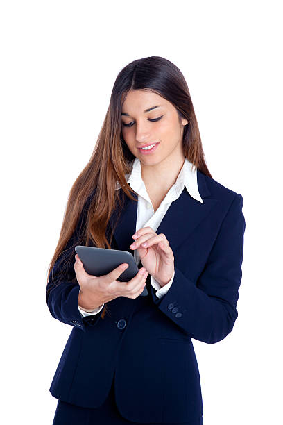 istock brunette indian business woman reading ebook tablet pc 147539521