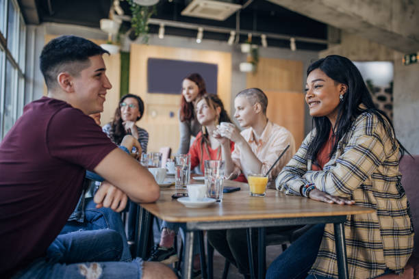 istock Friends together in cafe 1475399819