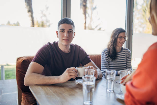 istock Friends sitting in cafe 1475402762