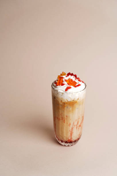 istock Milkshake cocktail glass with syrup, close-up 1475407016