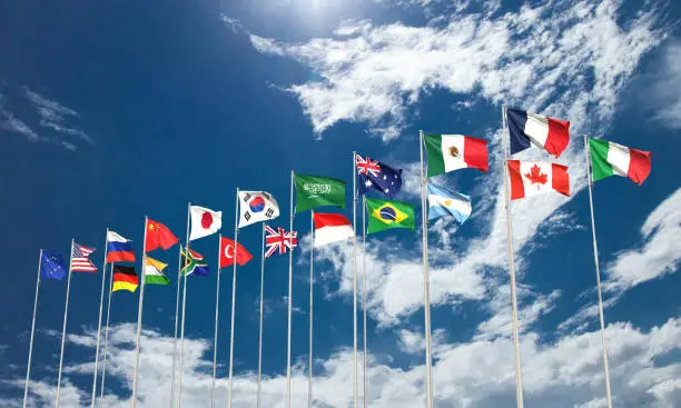 Photo of G20 g flag blue sky  country international g twenty world earth global planet summit usa america russia japan china germany italy g20 twenty economy politic g government member relationship strategy