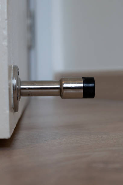 istock White door with door stopper 1475408426