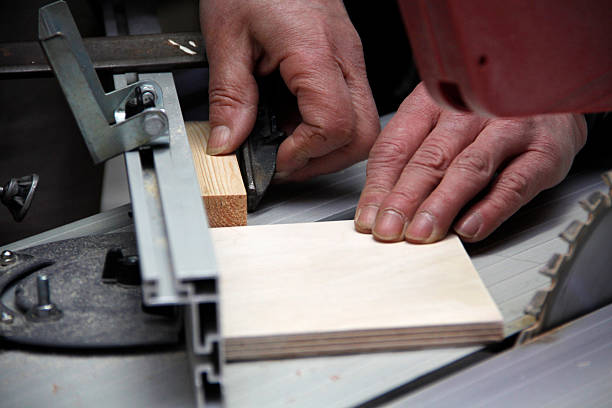Preparing to cut wood stock photo