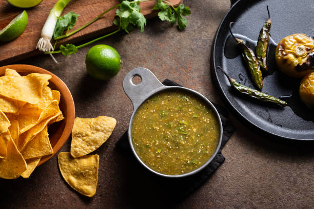 Salsa Verde Roasted Tomatillo Salsa (Salsa Verde) with Serrano Chili Peppers fresh cilantro stock pictures, royalty-free photos & images