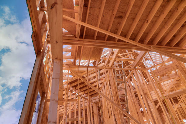 istock A newly constructed stick house will require constructing wooden roof rafters, and timber beams from the framework of the trusses that were used to construct the frame 1475428090