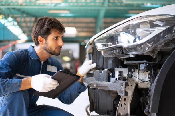 istock Young entrepreneur work at car garage. 1475430281