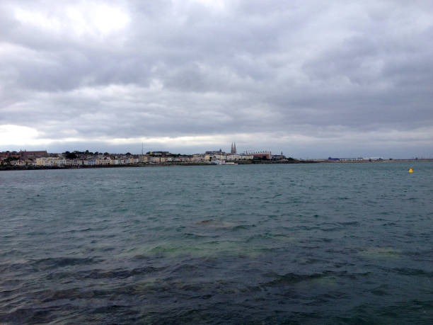 istock Dun Laoghaire harbor and town as seen from the water 1475444163