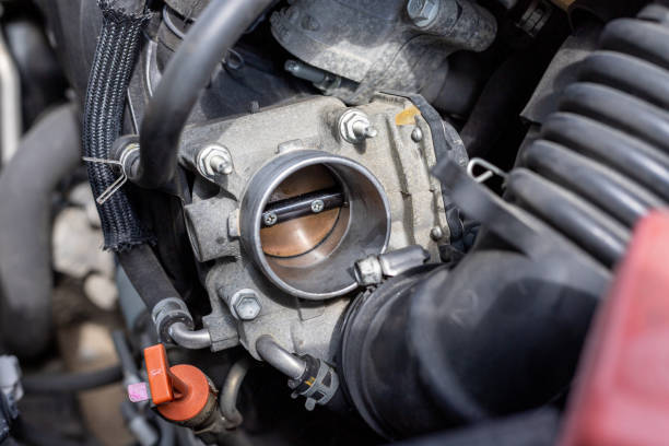 cleaning car engine throttle body closeup with selective focus - throttle imagens e fotografias de stock