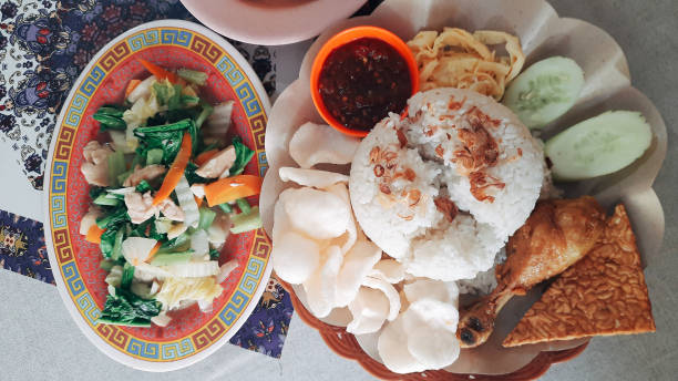istock Indonesian nasi uduk rice with fried chicken 1475445150