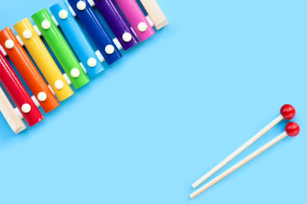 istock Colorful xylophone on blue background. 1475447894