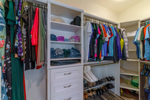 istock Built-in wall-mounted shelving unit in a small walk-in closet 1475455486