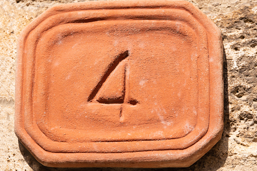 Pottery Street Number Plate No. 4 On An Old House In San Gimignano