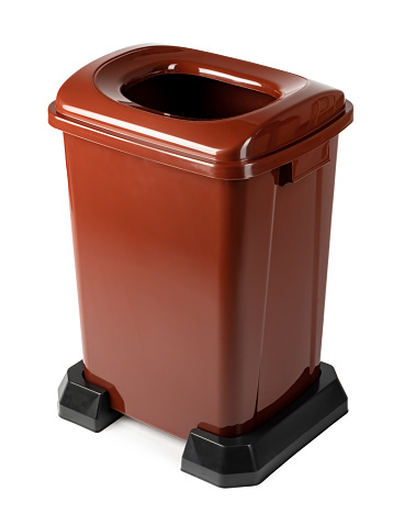 Brown plastic waste bin isolated on white background