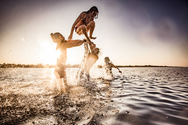 istock Fun in the sea at sunrise! 1475472751