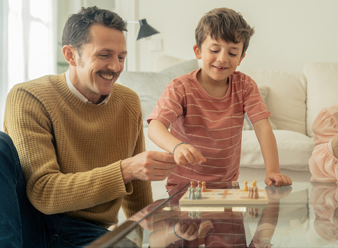 Family playing board games