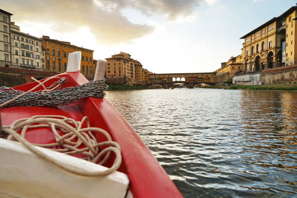 Ponte Vecchio seen from a boat on the Arno River in Florence, Tuscany, Italy