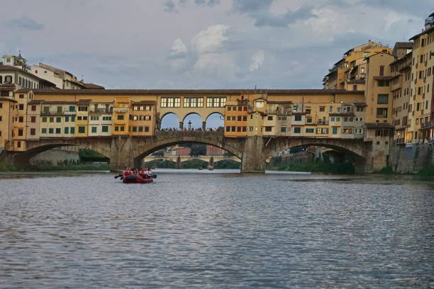 Ponte Vecchio seen from a boat on the Arno River in Florence, Tuscany, Italy
