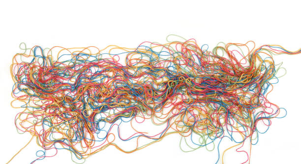 istock Tangled colorful cotton threads isolated on white background. 1475488121