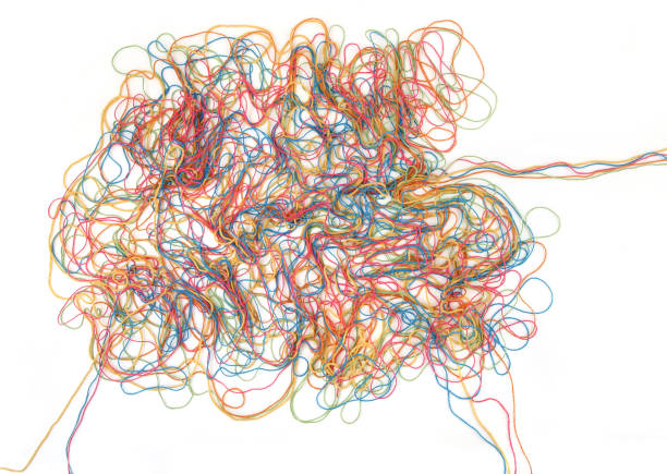istock Tangled colorful cotton threads isolated on white background. 1475488173