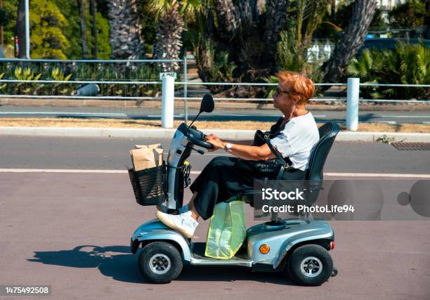 Still On The Move Stock Photo - Download Image Now - Mobility Scooter, Moped, Relaxation