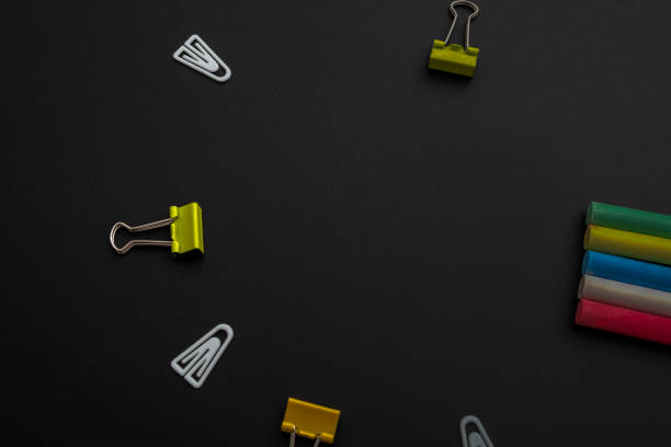 istock School supplies on a blackboard for children 1475496746