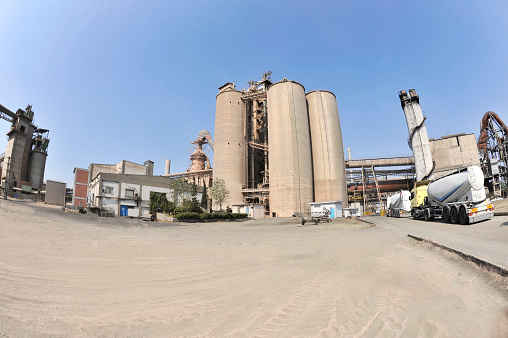 Trucks at backyard of cement factory