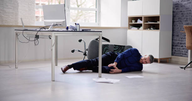 istock Faint Accident In Office. Fall From Chair 1475501652
