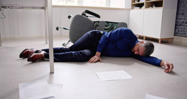istock Faint Accident In Office. Fall From Chair 1475501662