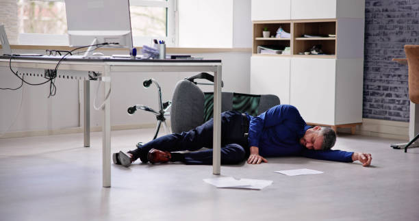 istock Faint Accident In Office. Fall From Chair 1475501674
