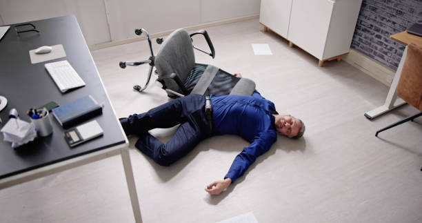 istock Faint Accident In Office. Fall From Chair 1475501678